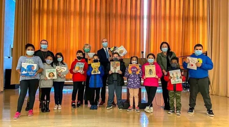 Johnson Brunetti Gifts Winter Coats & Books To Harmony Grove 4th Graders